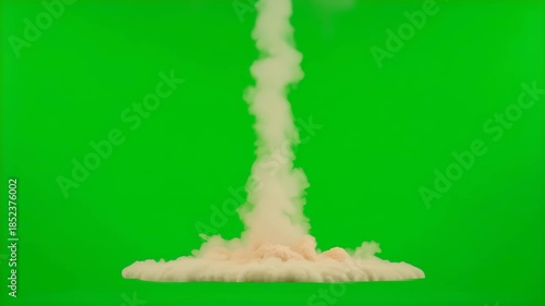 Dynamic nuclear explosion with towering mushroom cloud against green screen for VFX compositing