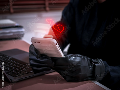 Romance scam concept showing a cybercriminal using a smartphone to deceive victims with fake love messages. Online dating fraud and social engineering risk through chat applications and social media.