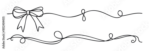 Elegant black ribbon bow with flowing decorative flourishes and swirls for gift wrapping celebratory announcements and special occasion invitations