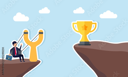 Businessman riding a slingshot trying to reach a trophy on the other side of a cliff illustrating the effort to achieve recognition as a leading company