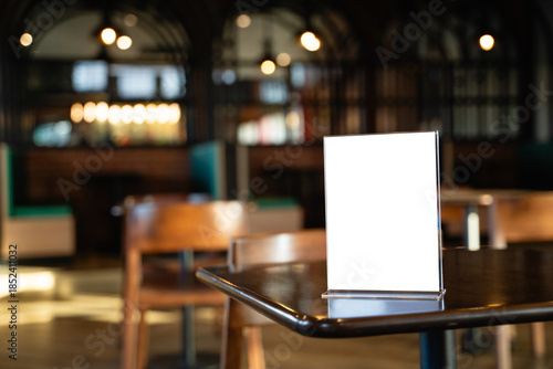 Wallpaper Mural Blank menu display stand Mock up Menu frame tent card blurred background in cafe interior design key visual layout. Torontodigital.ca