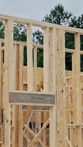 New wooden framing for building stands tall construction framework beams