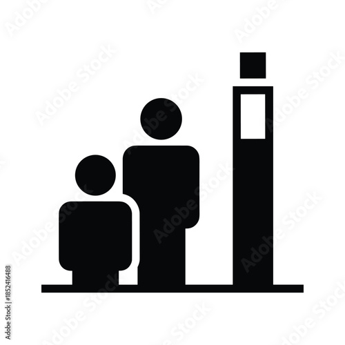 Family standing together near tall monument