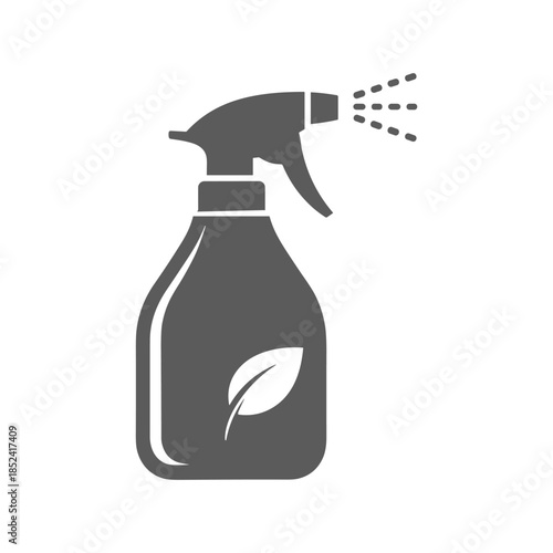 Eco friendly cleaning spray bottle with leaf symbol spraying liquid.