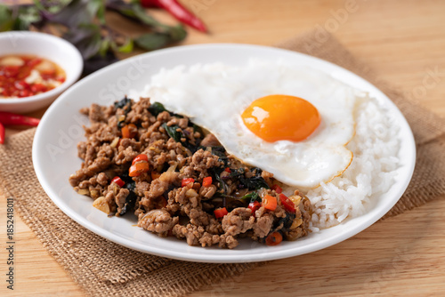 Thai food, Stir fried holy basil with minced pork with cooked rice and fried egg on top