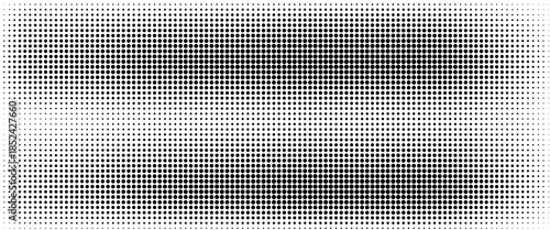 Dotted halftone gradient texture. Fading polka dot background. Repeated dots gradation pattern background. Black vanishing comic pop art overlay backdrop.