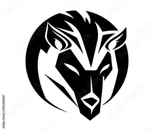 Stylized black and white illustration of a fierce wolf head in a circular emblem, conveying power and wild spirit.
