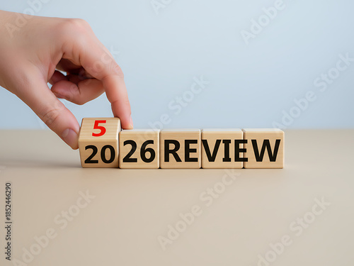 2025 business review, flipping of 2025 to 2026 on wooden blocks. Business and customer review for business strategic planning for the next year 2026. End of the year business. Business Strategy