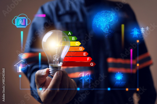 energy management concept efficiency rating labelling with engineer holding light bulb for economy class of electrical household appliances