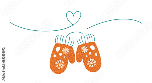 Cute pair of orange knitted winter mittens decorated with snowflakes hanging from a string with a heart shape above them.