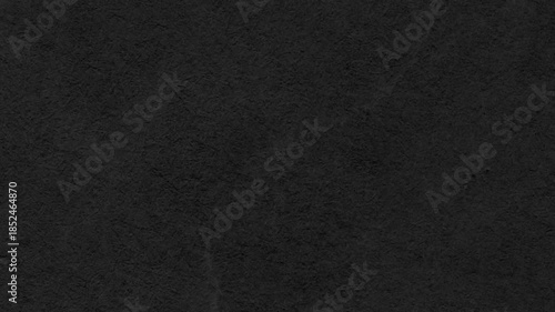 Dark Black Textured Slate Stone Surface Background for Professional Minimalist Video Design.High-quality dark charcoal textured background perfect for cinematic overlays, minimalist designs