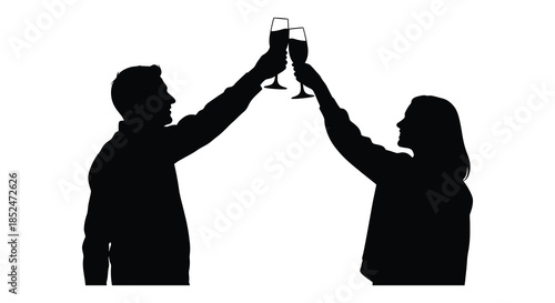 A couple joyfully toasting with glasses a romantic celebration captured in black silhouette
