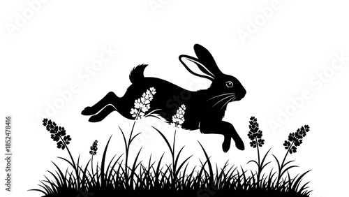 Black silhouette of a jumping rabbit with floral patterns on its body.