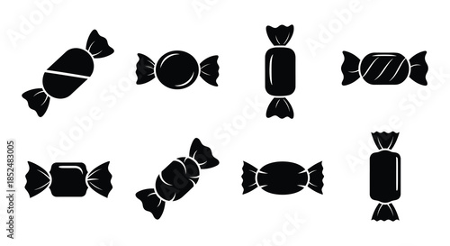 Black and white silhouettes of various candies and a teddy bear