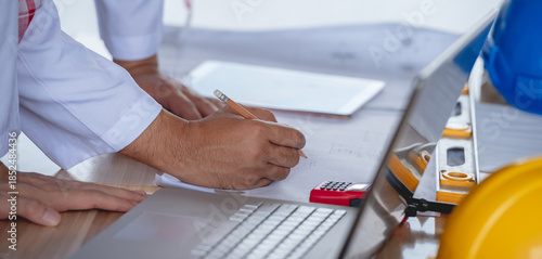 Banner of Hand and measuring tool Team work brainstorming many data analyst statistics drawing graph diagram work paper for best solution to explaining Business feasibility, increase sales profit