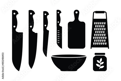 A collection of kitchen utensils and tools for food preparation.