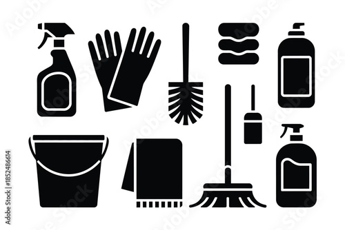 A collection of cleaning supplies, including a bucket, spray bottles, and brushes.