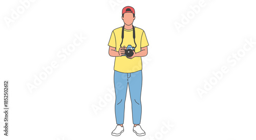 A young man holding a camera around his neck, dressed casually in a yellow t-shirt and blue jeans, ready to capture a moment.