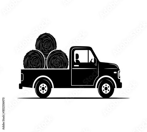 A black silhouette of a pickup truck transporting large hay bales in its open cargo bed