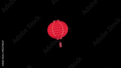 Glowing Lantern: A striking red lantern hangs suspended against a vast black expanse, its warm light providing a beautiful illumination.