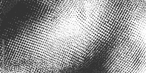 Black and white halftone pattern with gradient dots and textured areas abstract background