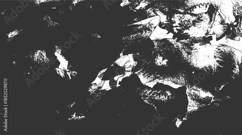 Abstract textured grunge background with dark gray and white irregular shapes and speckles