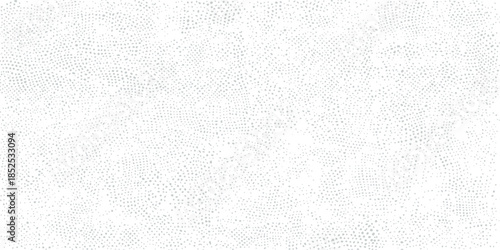 A seamless white paper and canvas texture background with a gray grunge pattern on a rough aged wall surface material for a blank textured fabric backdrop design