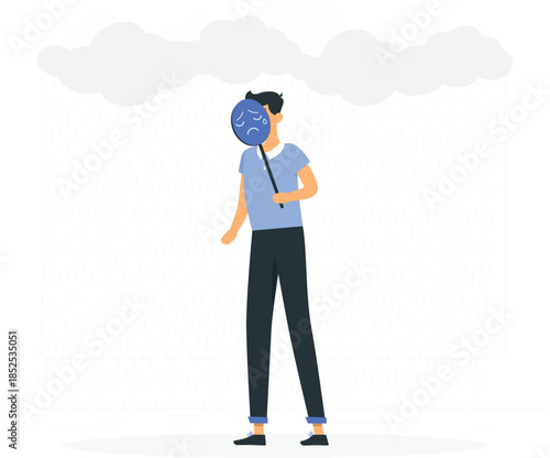 Man holding blue balloon with frowning face standing under rain clouds d