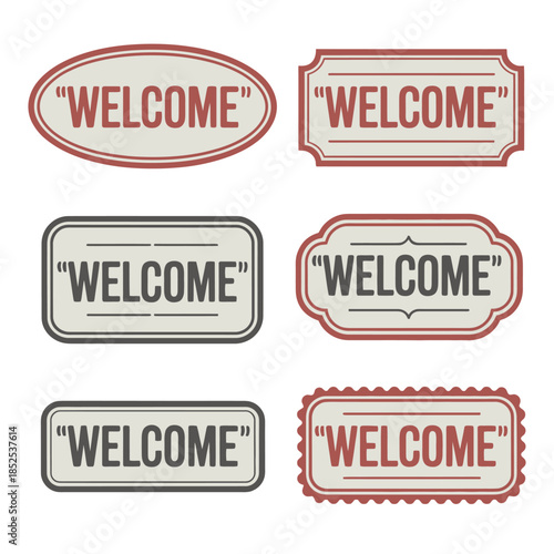 A collection of vintage-style "welcome" signs in various shapes and colors.