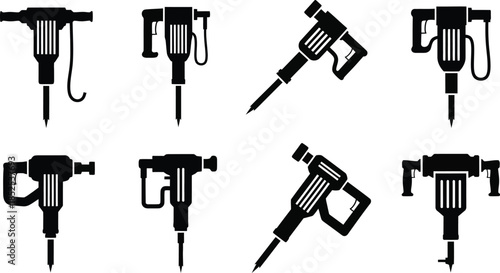Collection of power drills and impact wrenches in black silhouette on transparent background