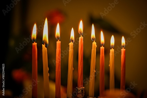 High resolution close up image of the celebration of the Jewish holiday of Hanukkah- lighting the full 8 candles of the Menorah- Israel