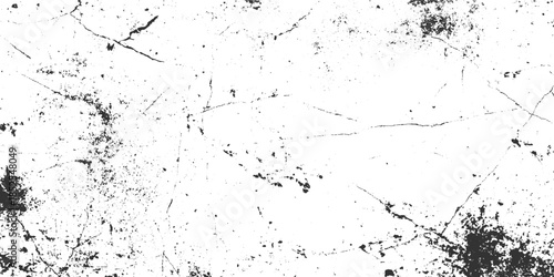 Black ink splatters and fine cracks on white textured background grunge abstract