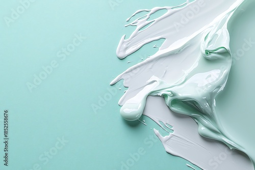 Abstract Splash of White Paint on Mint Green Background for Artistic Expression
