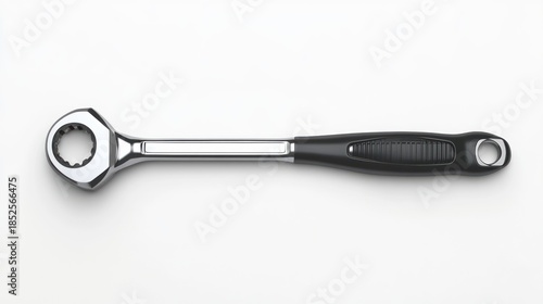 Shiny ratchet wrench on white background for construction and repair concepts