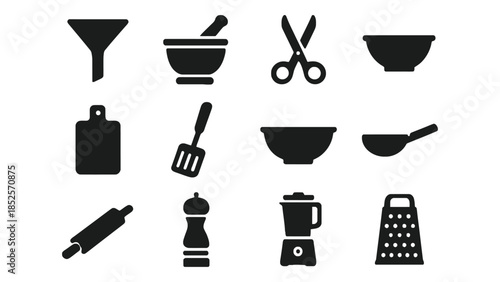 Collection of essential black kitchen utensils and tools arranged on a white background