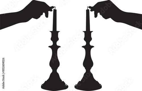 Hands lighting candles