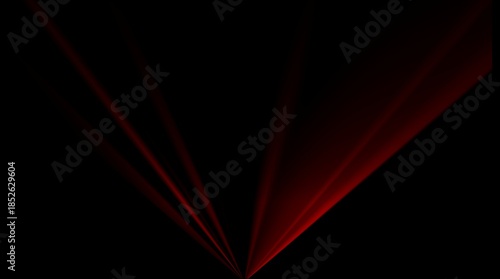 Red laser beams fan out from a dark background light rays abstract