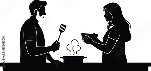 Couple cooking together in kitchen silhouette