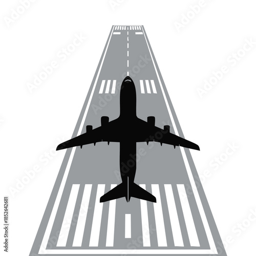 Airplane on runway preparing for takeoff or landing from a top-down view
