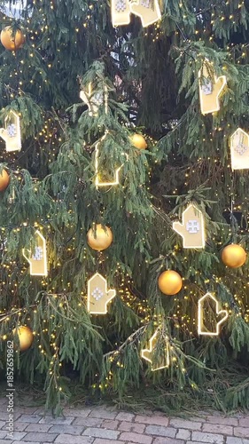 Christmas tree Big tall light sparkling blinking day street joy celebrations decorations city center downtown