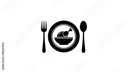 Plate with roasted chicken drumstick served with fork and spoon