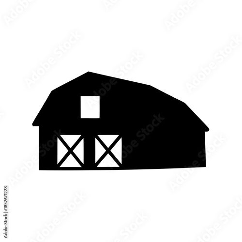 Silhouette of a classic barn with double doors and a window