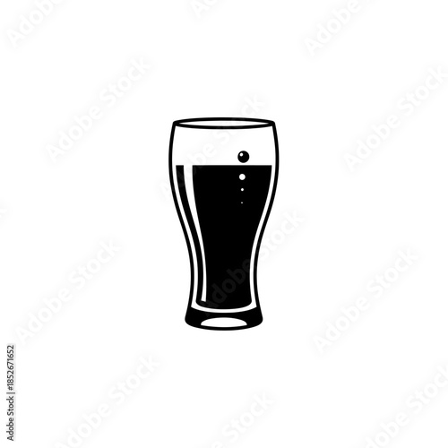 Full pint glass of dark stout beer with foam