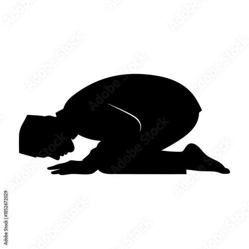 Silhouette of a person kneeling and bowing in prayer.
