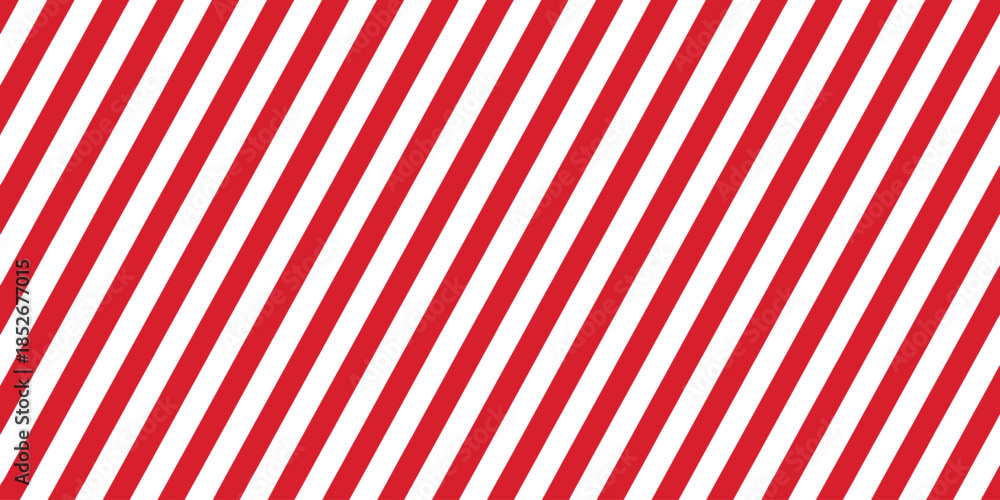 Obraz premium Striped candy cane seamless pattern with red and white diagonal stripes background, ideal for Christmas or New Year decoration, Xmas gift wrap, winter holiday packaging, and present wrapping paper des