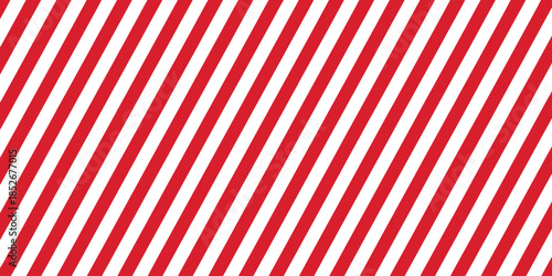 Striped candy cane seamless pattern with red and white diagonal stripes background, ideal for Christmas or New Year decoration, Xmas gift wrap, winter holiday packaging, and present wrapping paper des