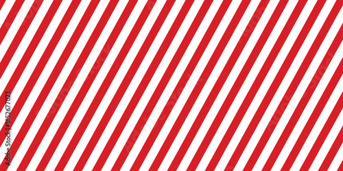Striped candy cane seamless pattern designed for Christmas and New Year decoration, with classic red and white diagonal stripes background, seasonal winter theme, and festive gift wrapping paper use.