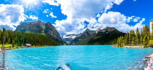 Bilde på lerret Tourists canoeing on lake louise in banff national park, canadian rockies