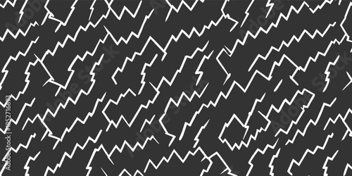 White jagged lines forming a chaotic pattern on a dark gray background abstract texture geometric