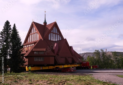 Fényképezés Kiruna, Sweden – August 19, 2025: The historic wooden Kiruna Church is being relocated to a new site as part of the urban transformation project